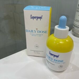 Supergoop! Daily Dose Hydra-Ceramide Boost + SPF in Yellow and White